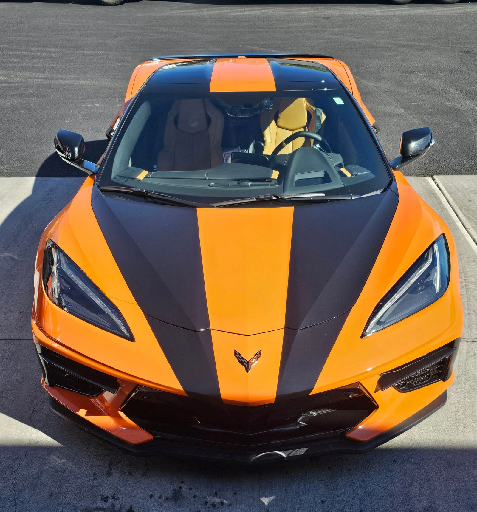 Corvette with a custom orange and black wrap