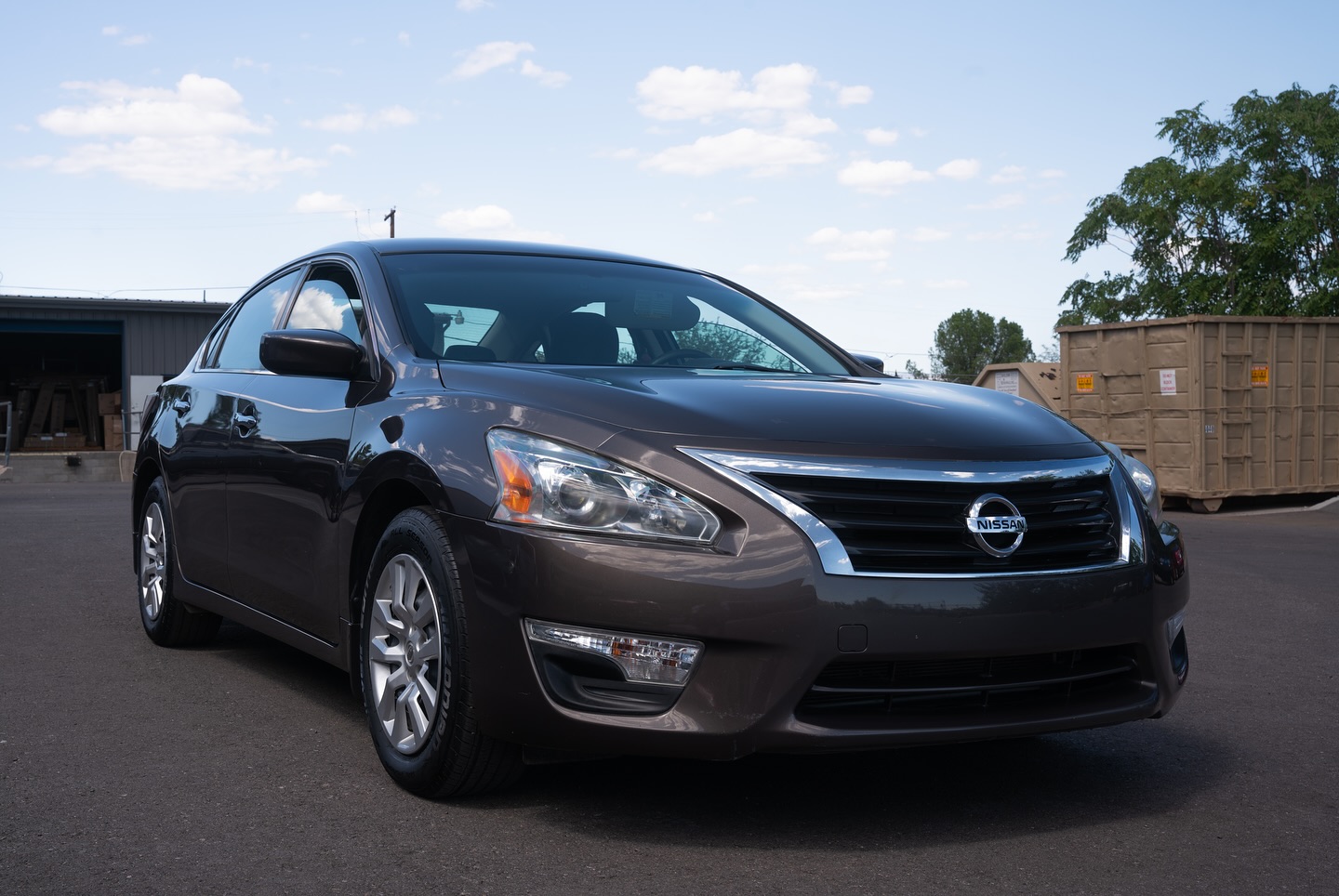 Brown Nissan Altima after a clear coat repair
