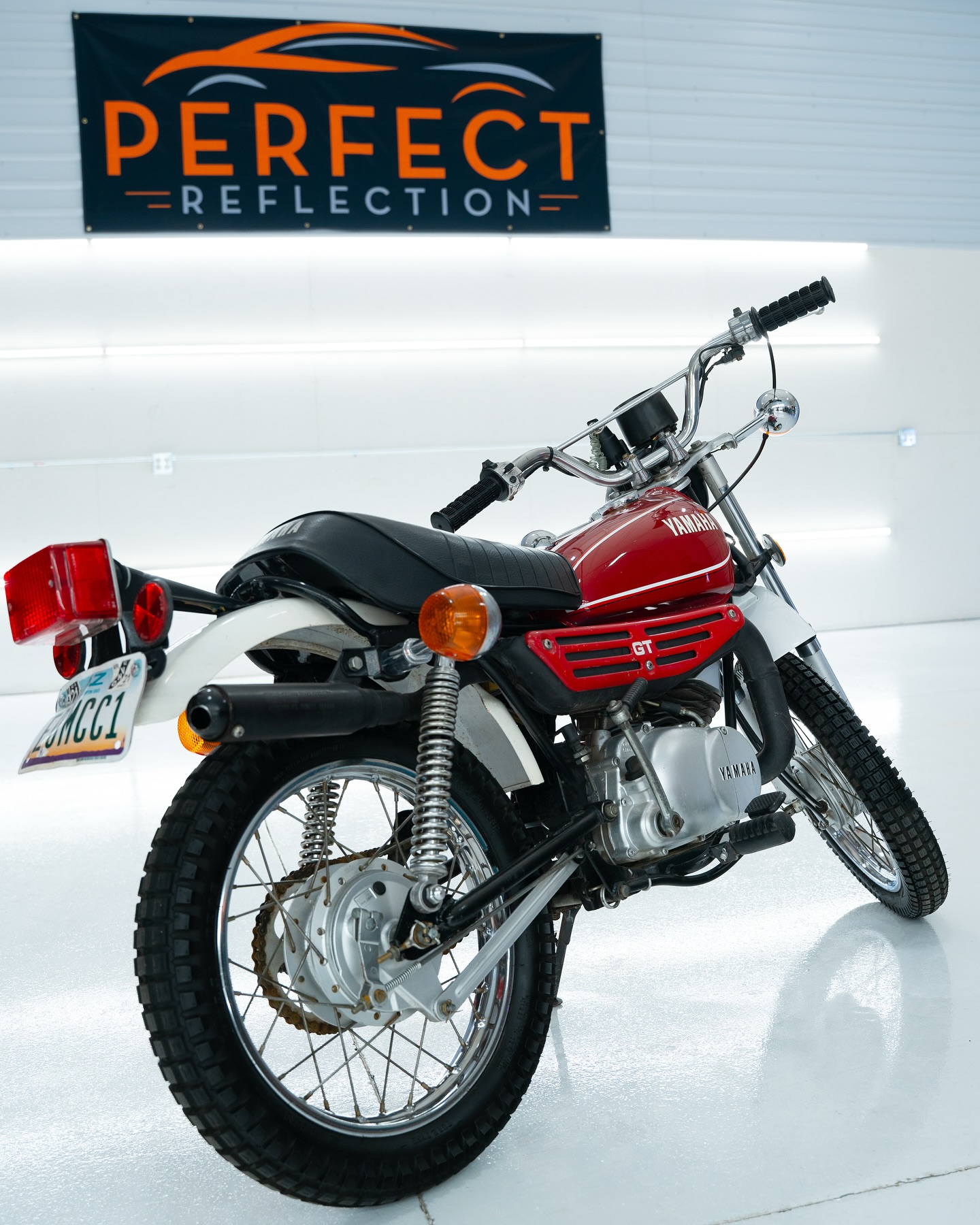 Red vintage minibike on a white background